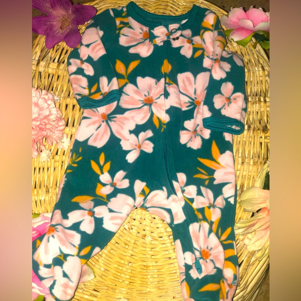 Carter’s newborn onesie with footies